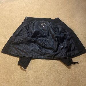 The clothing item pictured is a Black Gerry brand outdoor or softshell jacket